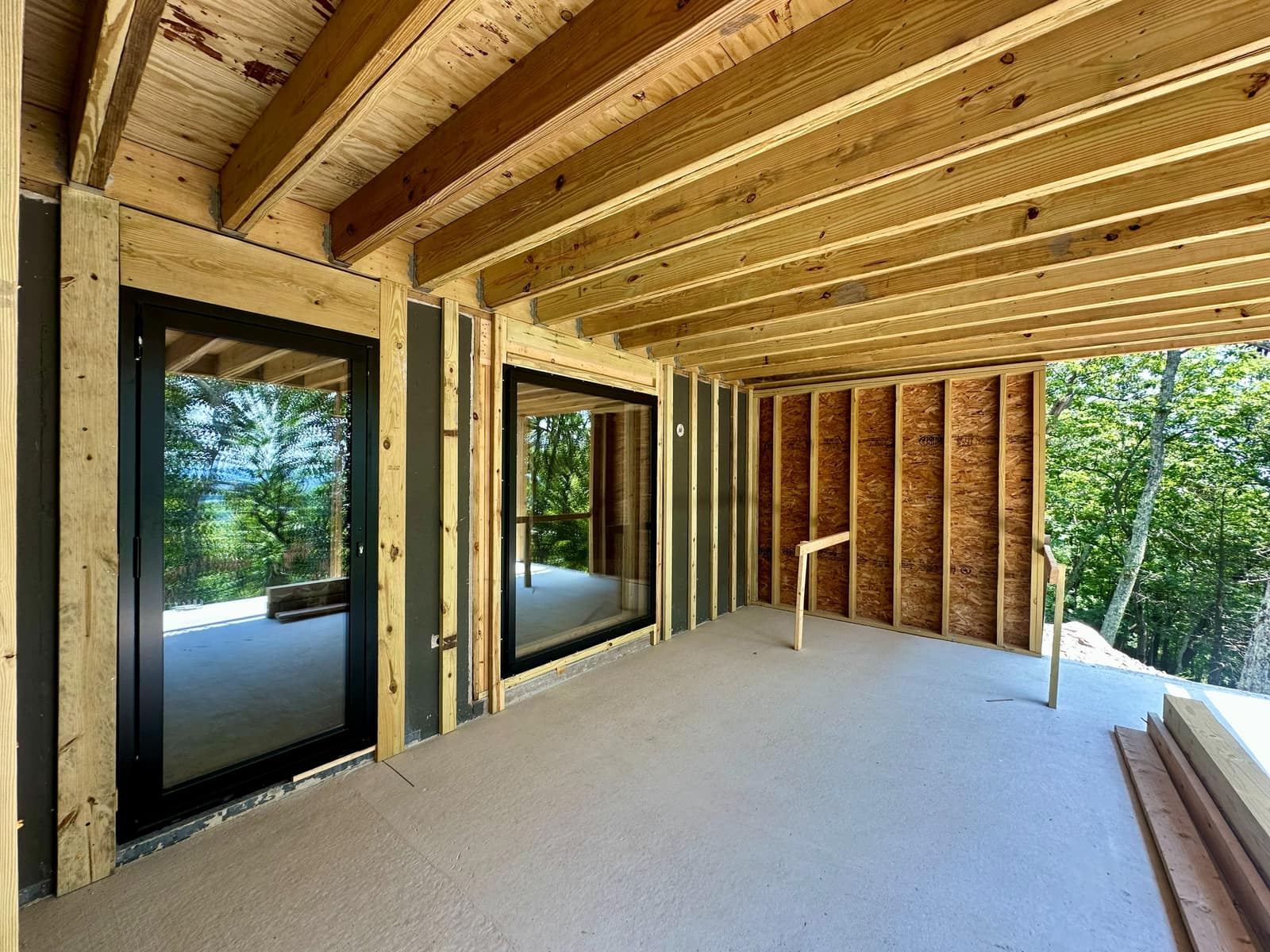 Bedroom wing - MasterLine 8 units set into the timber frame on a nailing flange.