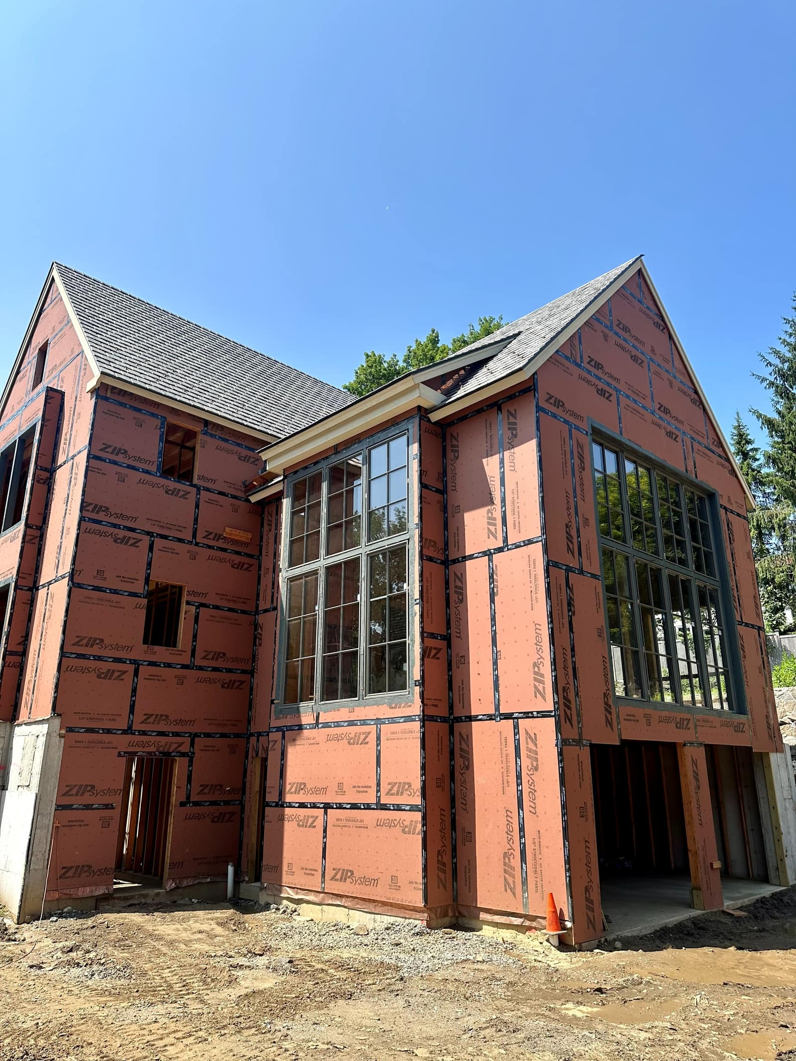Front corner with both gables glazed.