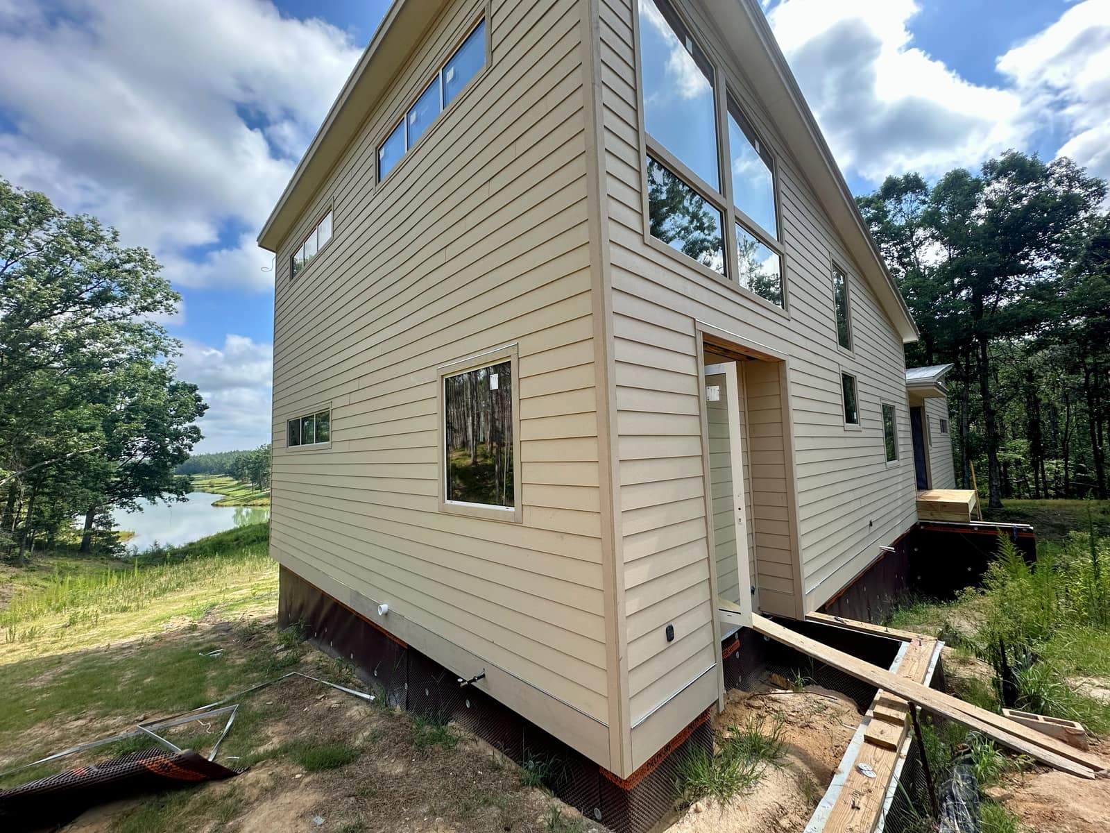 Gable end with a clerestory band above the main run.