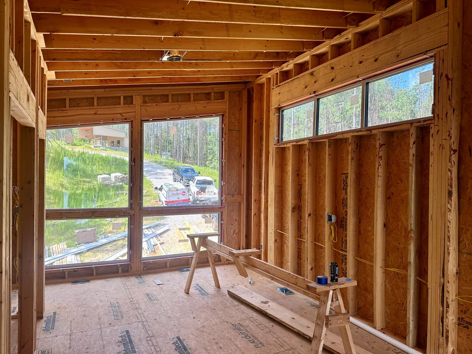 Clerestory strip carrying daylight deep into the plan.