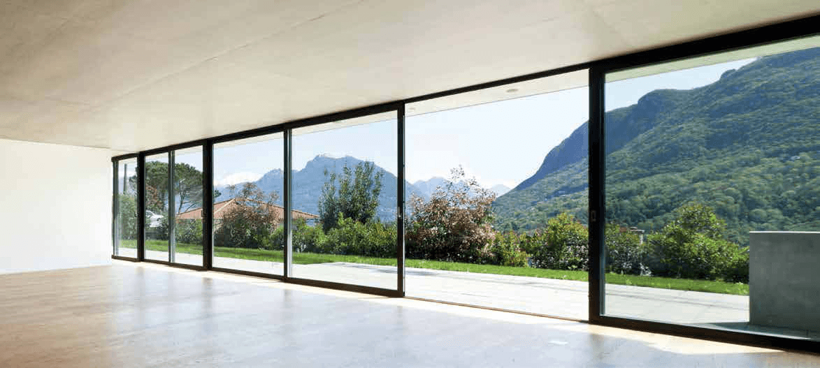 Illustrative manufacturer interior with a Synergic lift-and-slide timber patio door